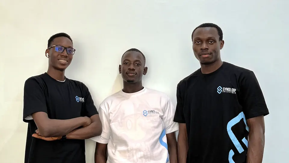 Synoloop's three founders standing together in Synoloop T-shirts